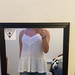 Spaghetti strap top with design in the front